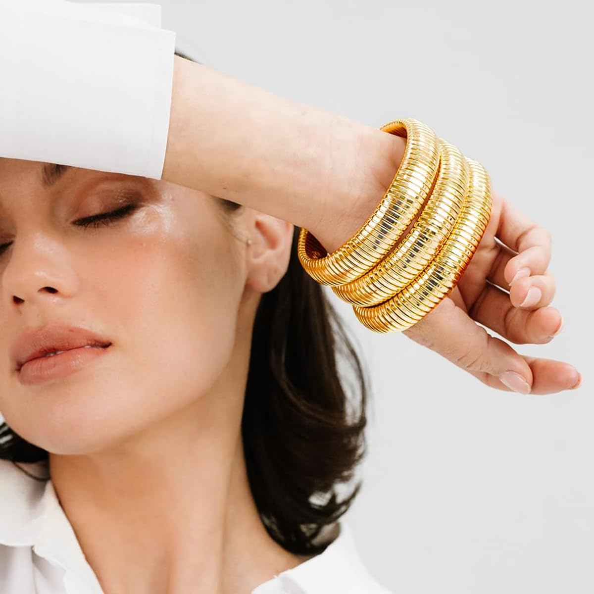 JUNYANGY Gold Bracelets for Women Set of 3 Gold Chunky Stretch Bangles Bracelets 24K Gold Plated Stainless Steel Bracelets Flexible Wide Stack Bracelets Designer Look Alike Jewelry for Women