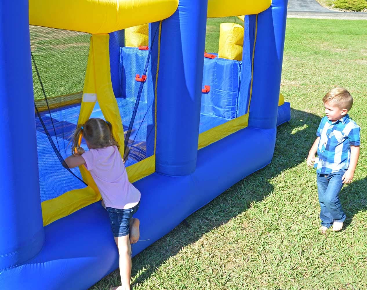 Island Hopper Racing Slide and Slam Inflatable Bounce House – Dual Slides, Climbing Wall & Basketball Hoop for Fun – Jumper for Kids with Durable PVC Build – Outdoor/Indoor Bounce House for Big Kids