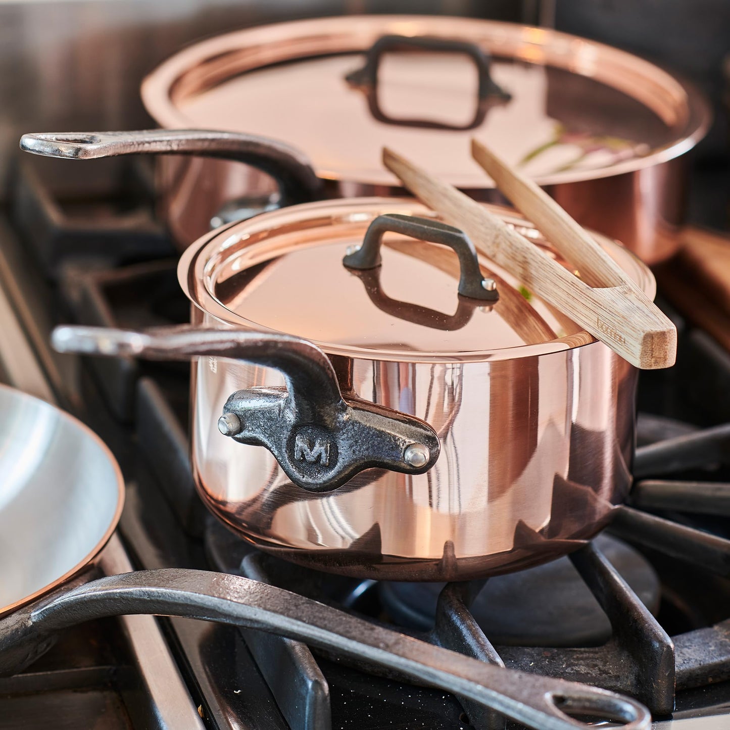 Mauviel M'Heritage 150 CI 1.5mm Polished Copper & Stainless Steel DeLuxe 3-Piece Cookware Set, With Sauce Pan With Lid, 2.8-Qt and Frying Pan 11.8-In, Cast Iron Handles, Made in France