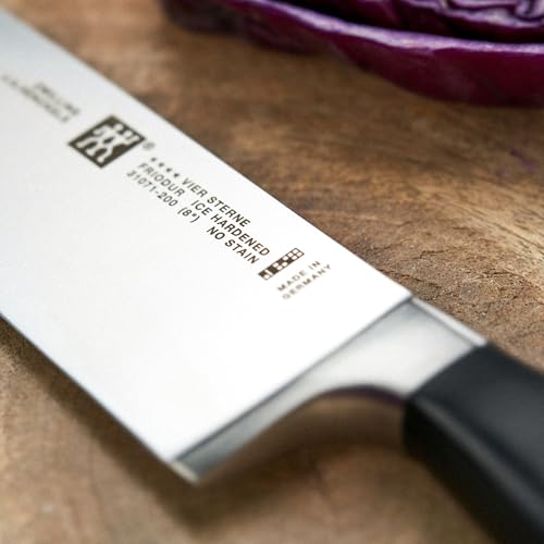 ZWILLING Four Star 8-inch Razor-Sharp German Chef's Knife, Made in Company-Owned German Factory with Special Formula Steel perfected for almost 300 Years, Dishwasher Safe