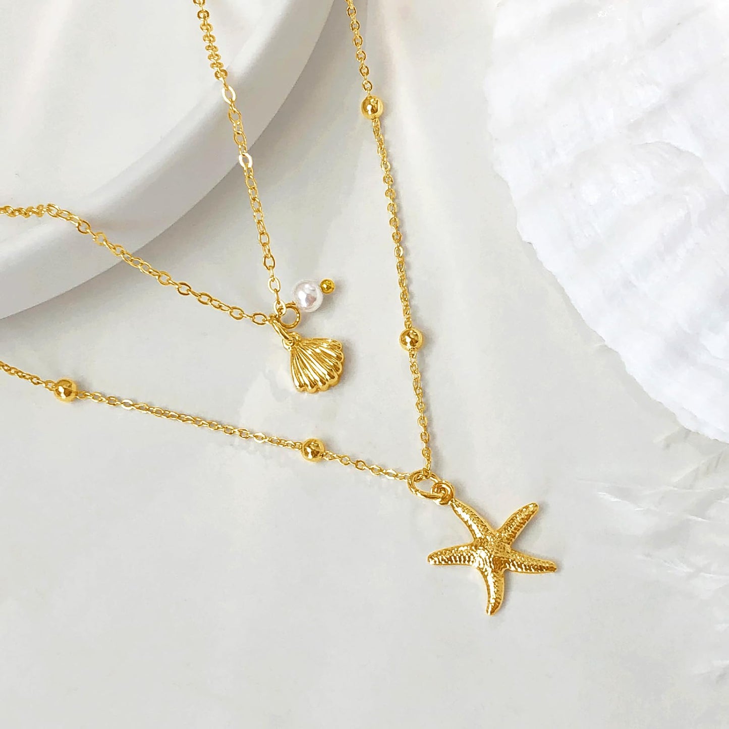 Zeffy Seashell Layered Charm Necklace for Women Dainty 14k Gold Plated Starfish Shell Pearl Pendant Waterproof Necklace Stack Choker Chain Jewelry for Summer Beach Vacation