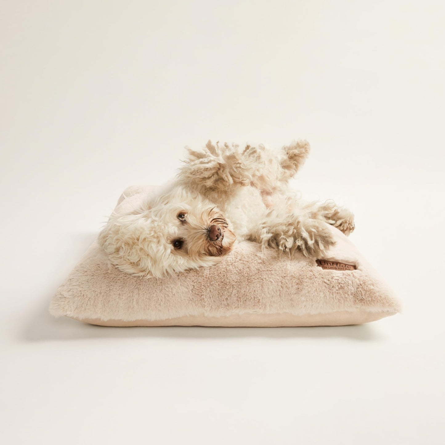 UnHide Floof Pet Bed - Medium (28" x 10") - Extra Soft Dog Bed - Removable Faux Fur Cover - Machine Washable - Helps Ease Pet Anxiety & Provides The Perfect Sleep - Beige Bear
