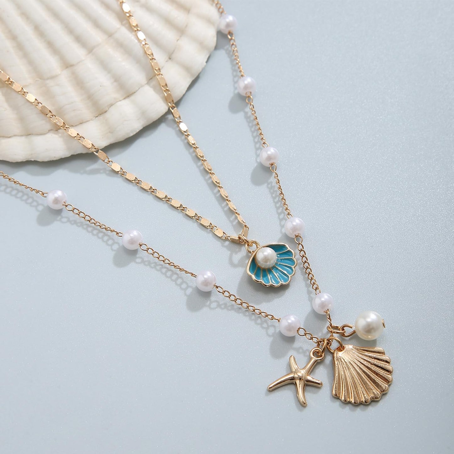 Shell Starfish Necklace for Women Gold Tone Layered Beach Jewelry Pearl Seashell Charm Adjustable Coastal Necklace for Summer Vacation Outfits Gifts