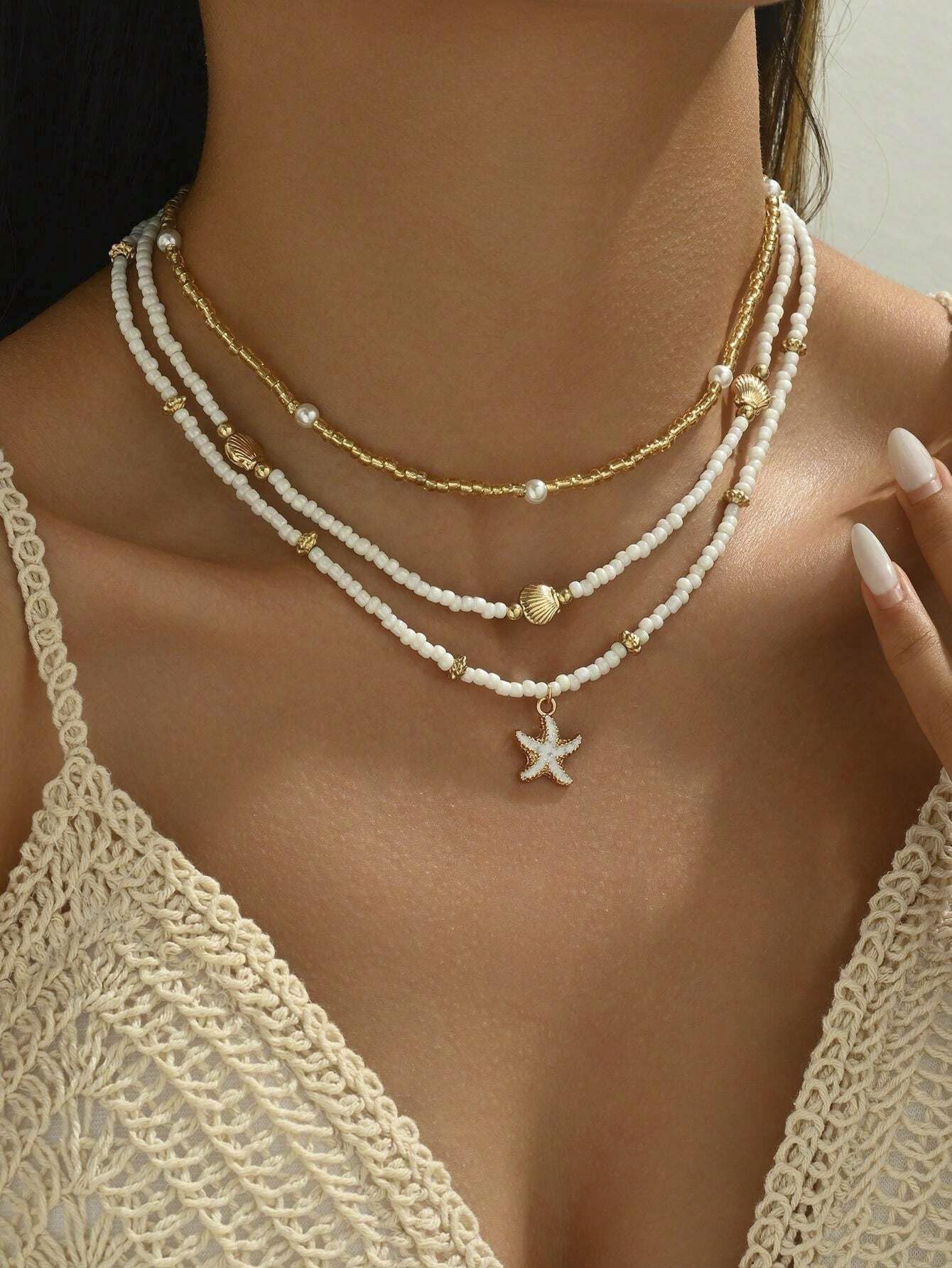 Lameybrt Cowrie Shell Surfer Necklaces, Hawaiian Beach Handmade Choker Set for Women, White Rice Bead with Black Accents, Bohemian Summer Seashell Choker 2 Piece Set, Perfect for Summer Beach Vacation, Birthday, Mother’s Day & Holiday Gifts (Shell 14 KL)