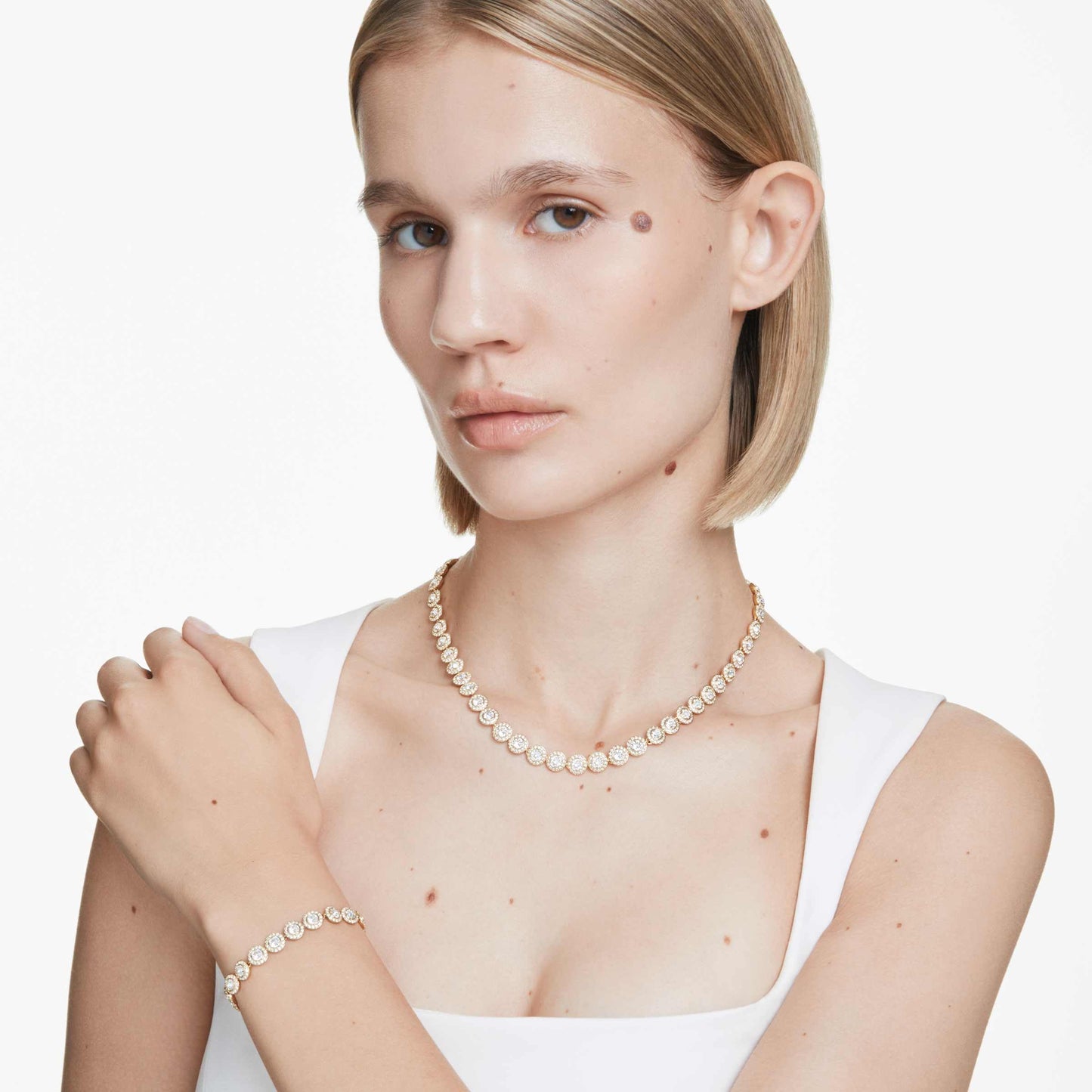 Swarovski Una Angelic set, Round cut, clear, Gold-tone finish