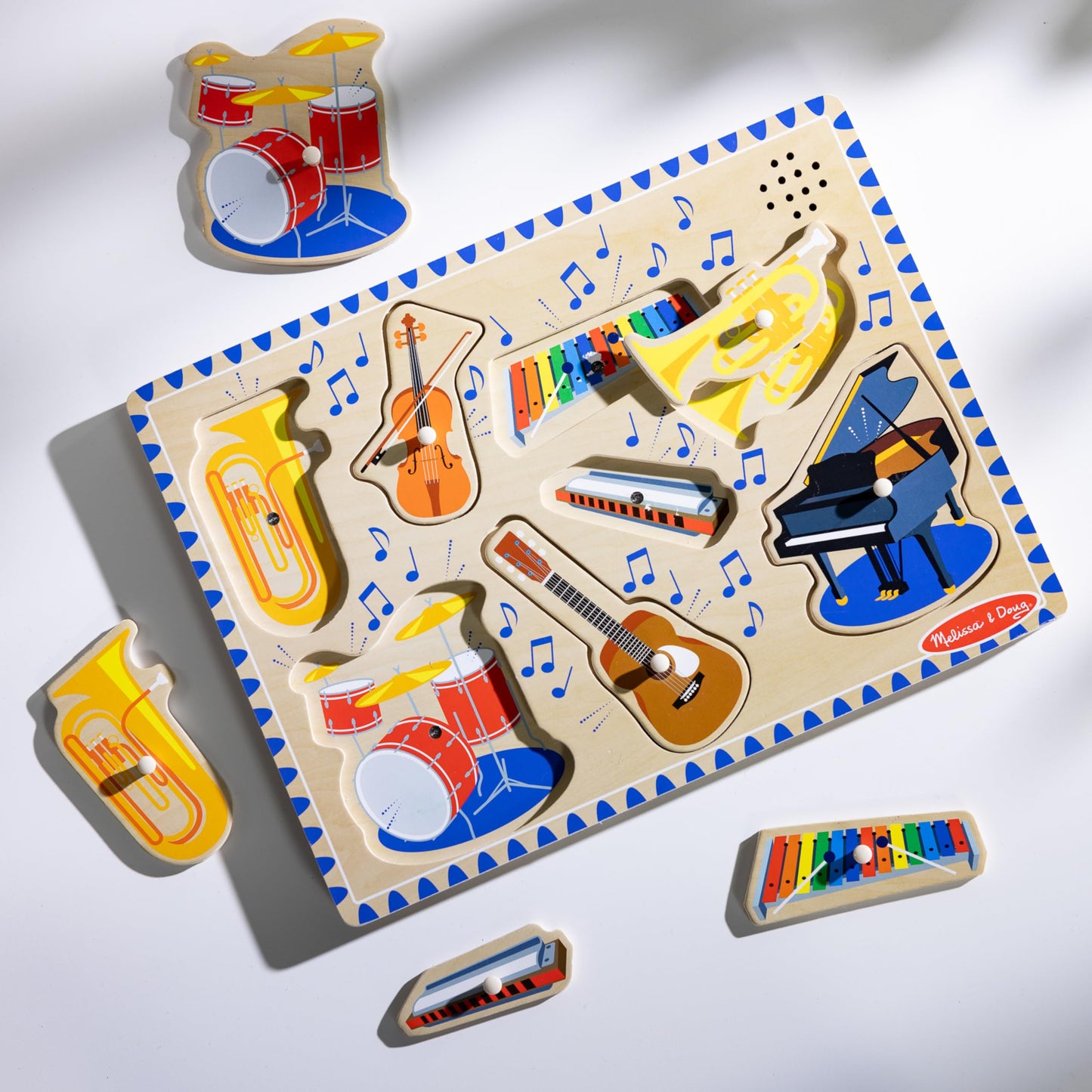 Melissa & Doug Musical Instruments Sound Puzzle - Wooden Peg Puzzle with Light-Activated Sound Effects (8 pcs) Wooden Peg Baby Music Learning Toys, for Toddlers and Preschoolers Ages 2+