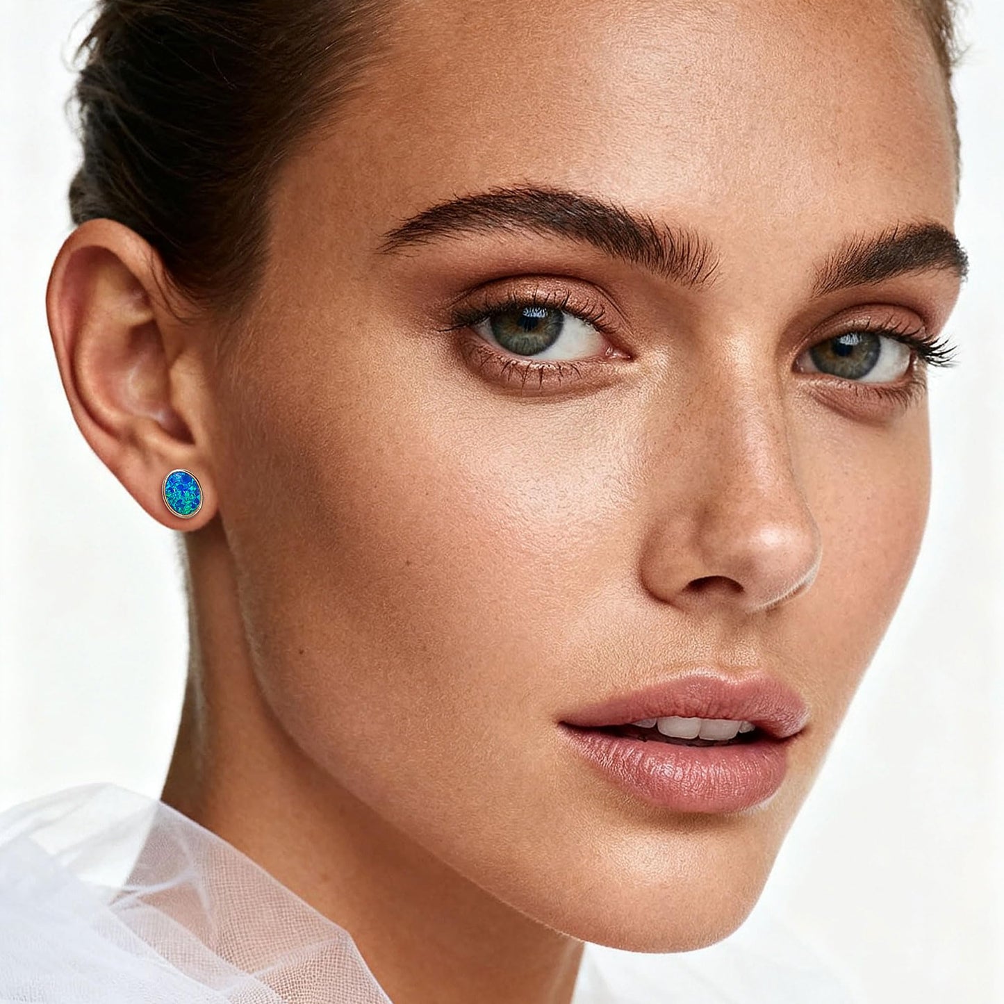 JiayangJY Silver Blue Fire Opal Stud Earrings for Women 18K White Gold Plated Sterling Silver Oval Shape 7mm Opal Earrings with Push Back