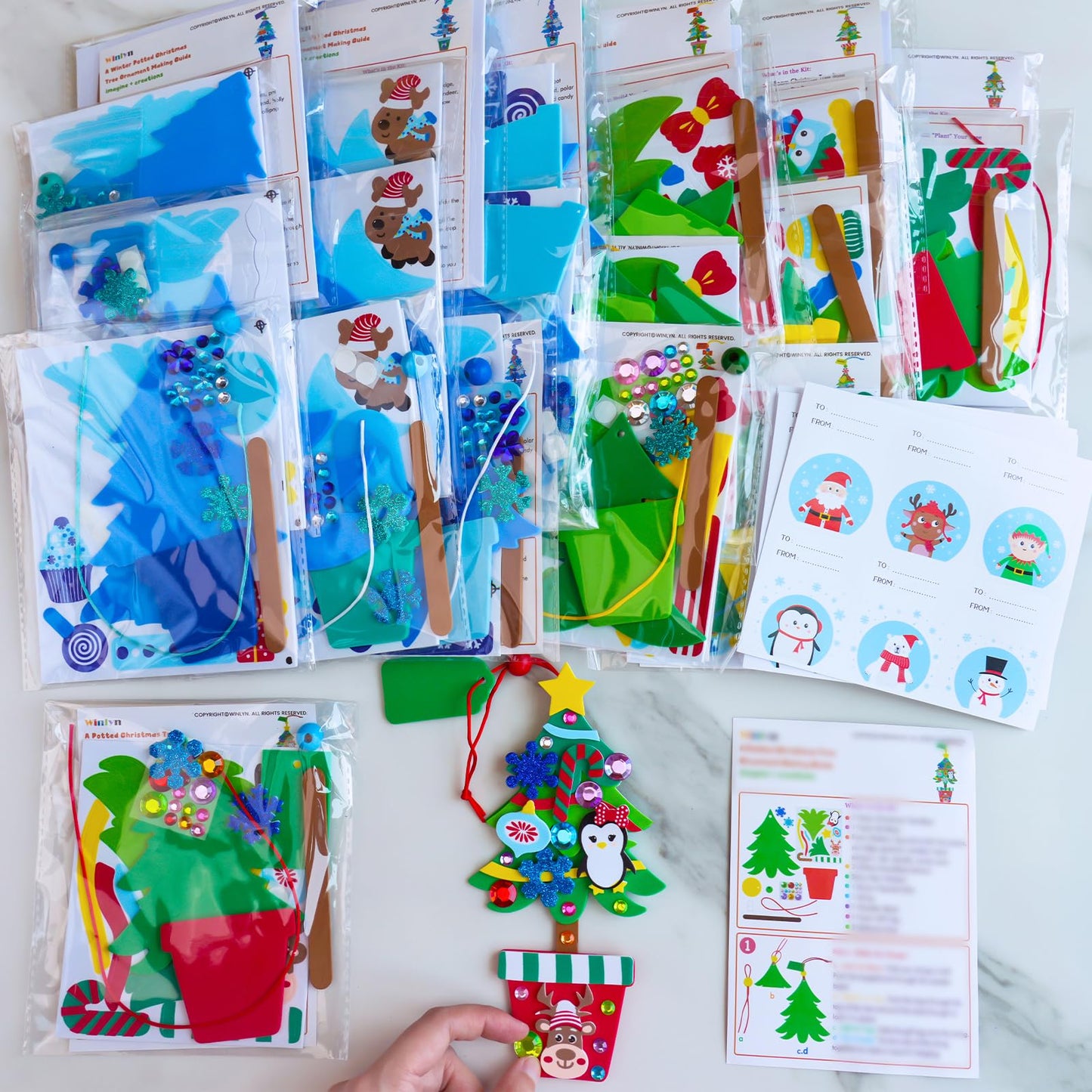 Winlyn 24 Sets Winter Decorations DIY Potted Pine Tree Ornaments Christmas Craft Kits Foam Tree with Festive Foam Stickers for Kids Holiday Seasonal Gift Home Classroom Activities Party Favors