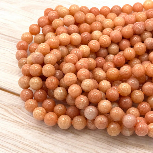 ABCGEMS Peruvian Strawberry Calcite Beads AKA Orchid Calcite (Well-Defined Peach & Orange Hues - Consistent Color with Minimal Fading or Dull Areas) Smooth Round 10mm