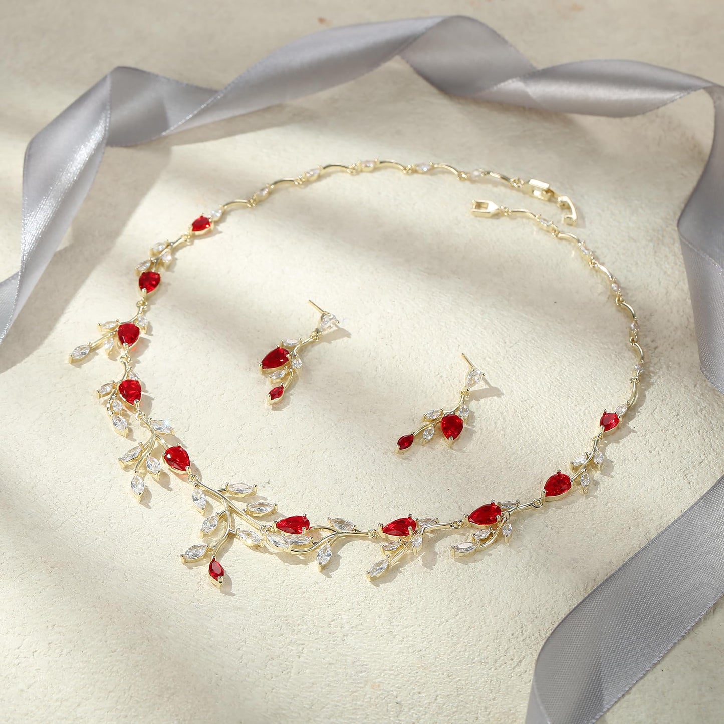 EVER FAITH Party Jewelry Set for Women, Sparkly Cubic Zirconia Pear-Shaped Birthstone Leaf Necklace Earrings Sets for Prom Red Gold-Plated-Brass