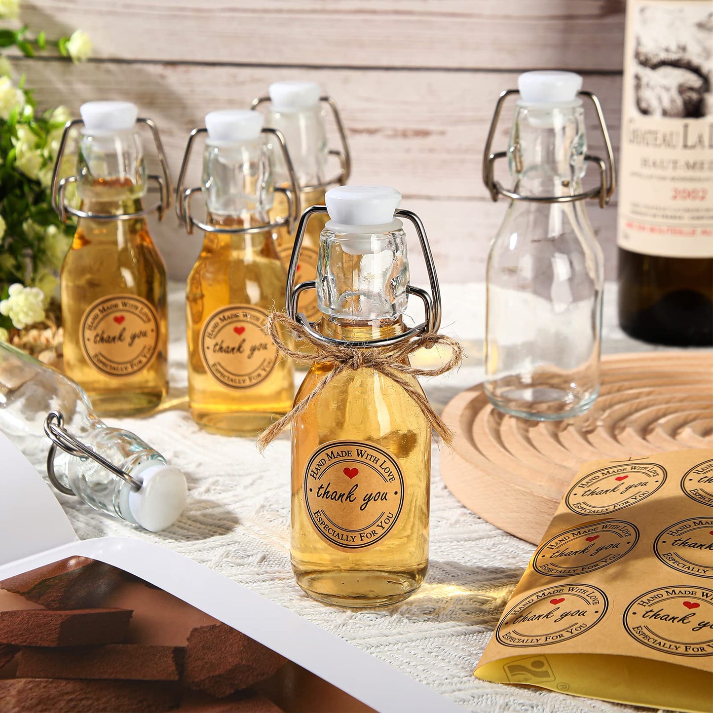 Queekay 30pcs 4.05oz Glass Bottles with Swing Top, Air Tight Kraft Stickers, Ideal for Spices, Drinks, Party Favors