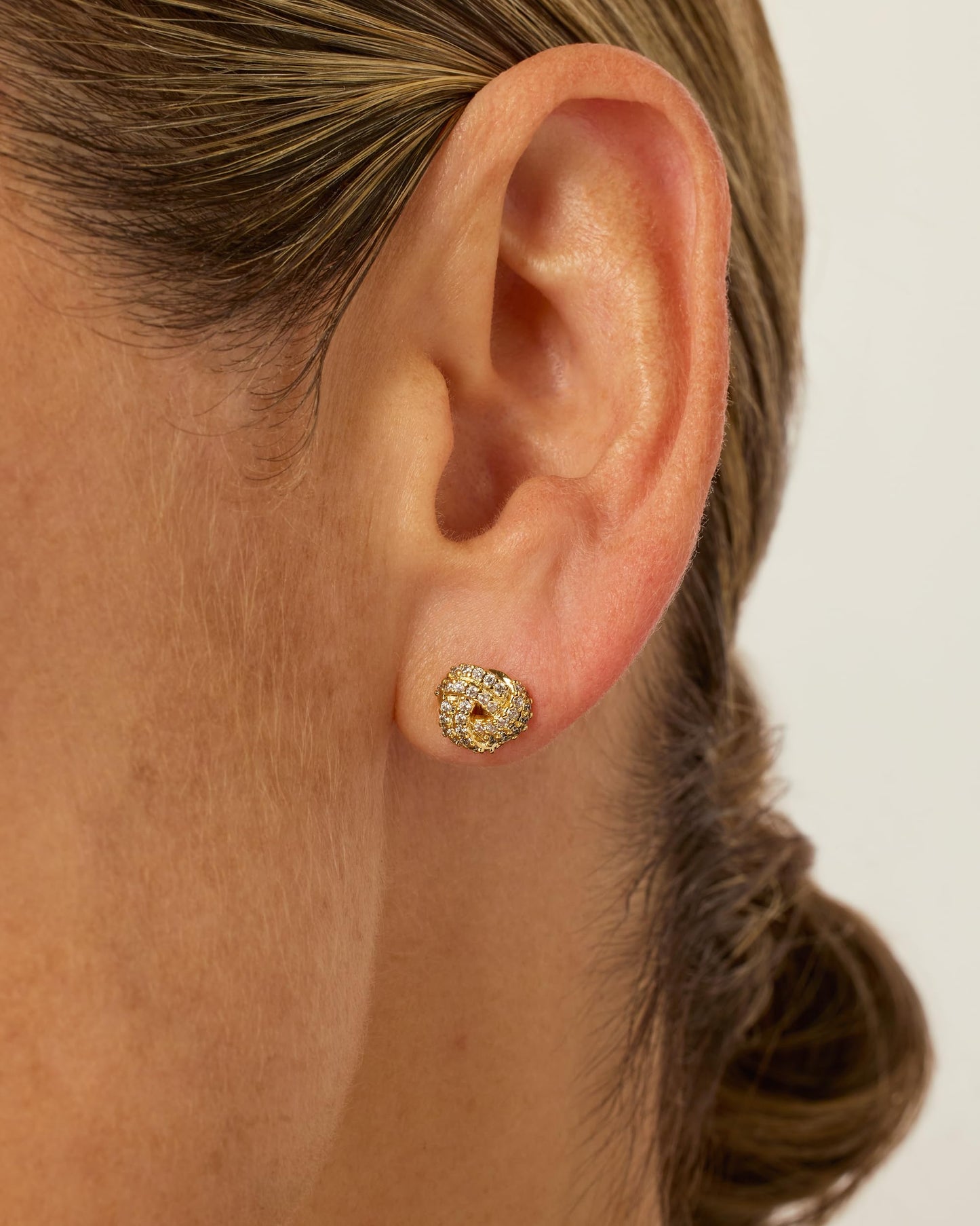 PAVOI 14K Gold Plated 925 Sterling Silver Post Cubic Zirconia Love Knot Stud Earrings, 14K Gold Plated in White Gold