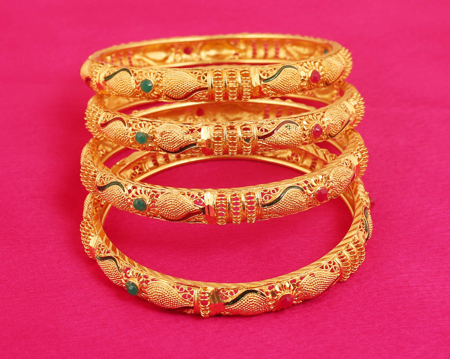 Touchstone "Golden Bangle Collection Indian Bollywood Desire Beautifully Carved Conch Shell Inspired Faux Ruby Emerald Thick Designer Jewelry Bangle Bracelets. Set of 4. In Gold Tone For Women