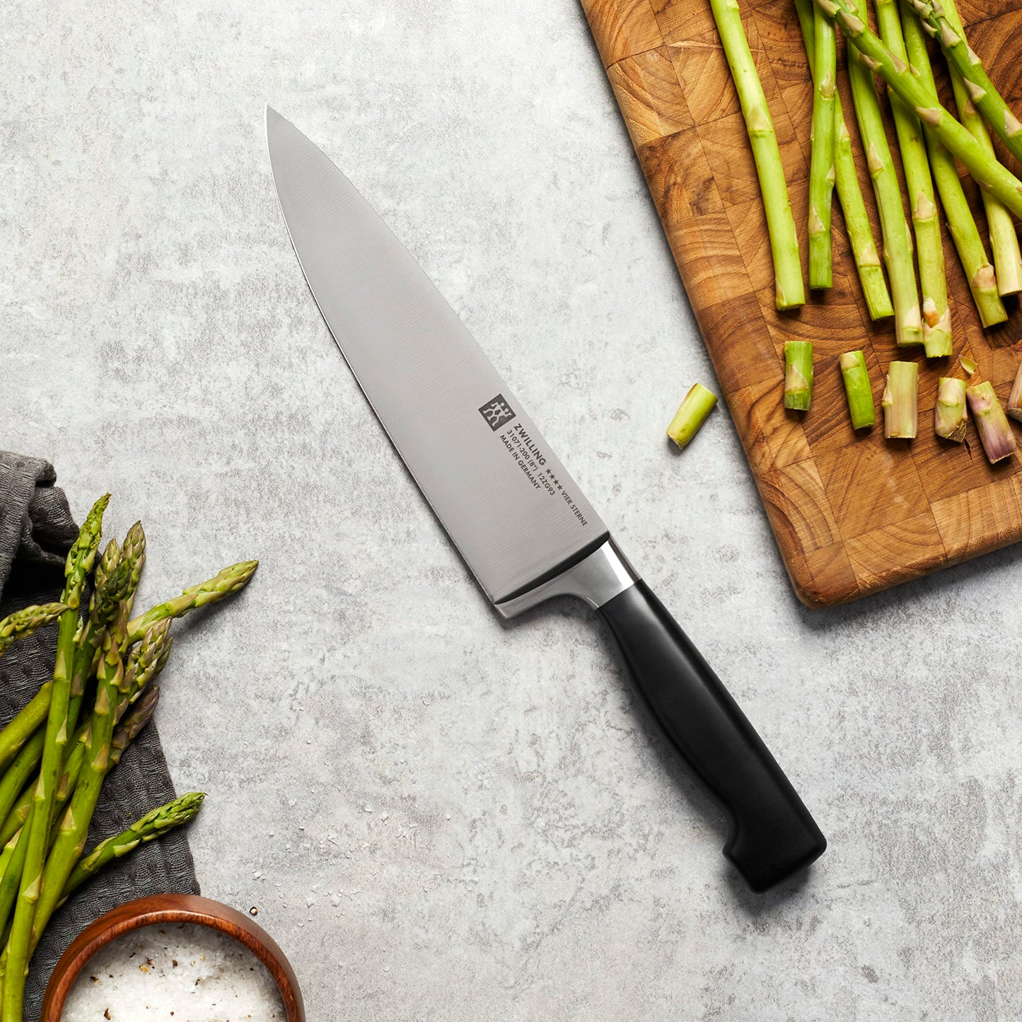 ZWILLING Four Star 8-inch Razor-Sharp German Chef's Knife, Made in Company-Owned German Factory with Special Formula Steel perfected for almost 300 Years, Dishwasher Safe