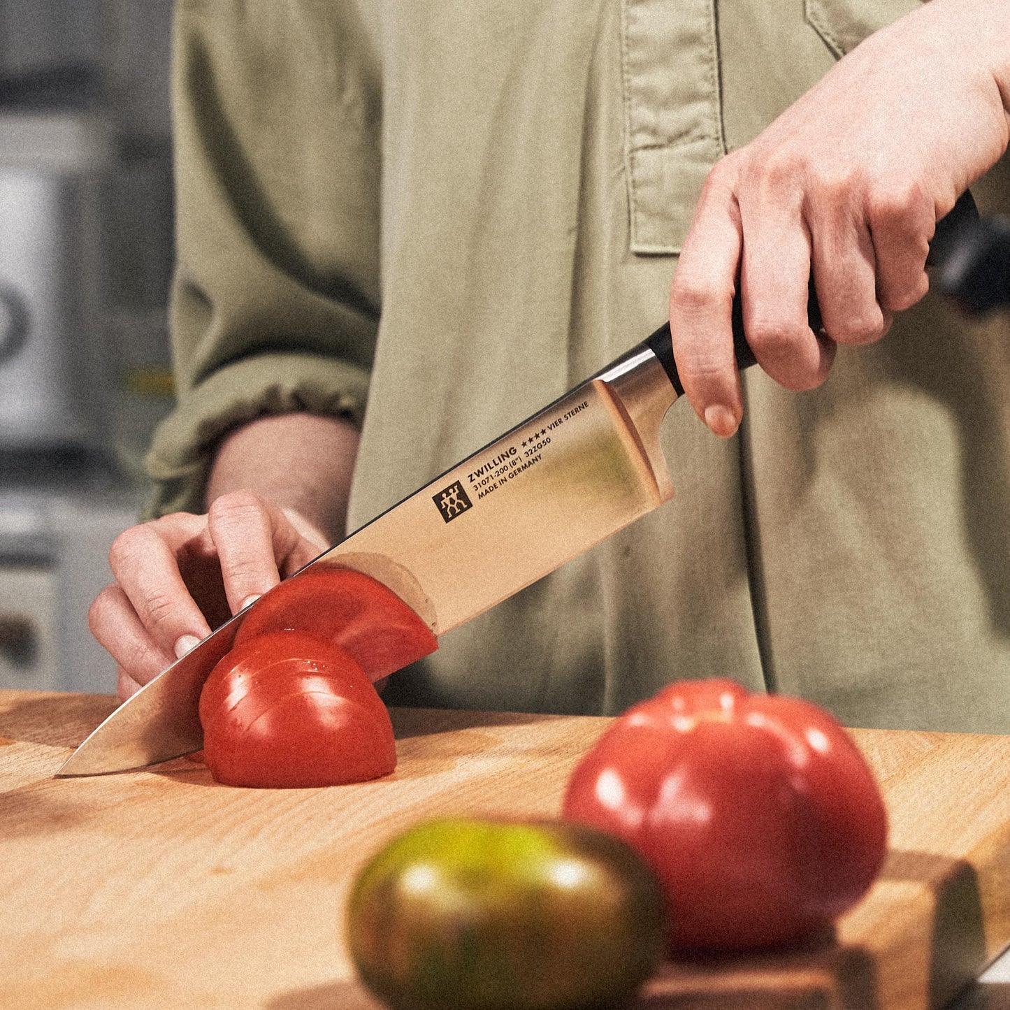 ZWILLING Four Star 8-inch Razor-Sharp German Chef's Knife, Made in Company-Owned German Factory with Special Formula Steel perfected for almost 300 Years, Dishwasher Safe