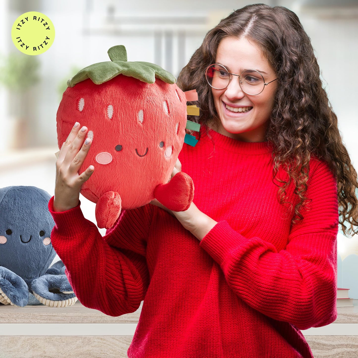 Itzy Ritzy Snuggles Plush Toy – Soft Stuffed Animal for Babies, Kids & Adults – Sensory Ribbons & Textured Fabrics for Tactile Play – Cozy & Cuddly Companion for Newborns & Up (Strawberry)